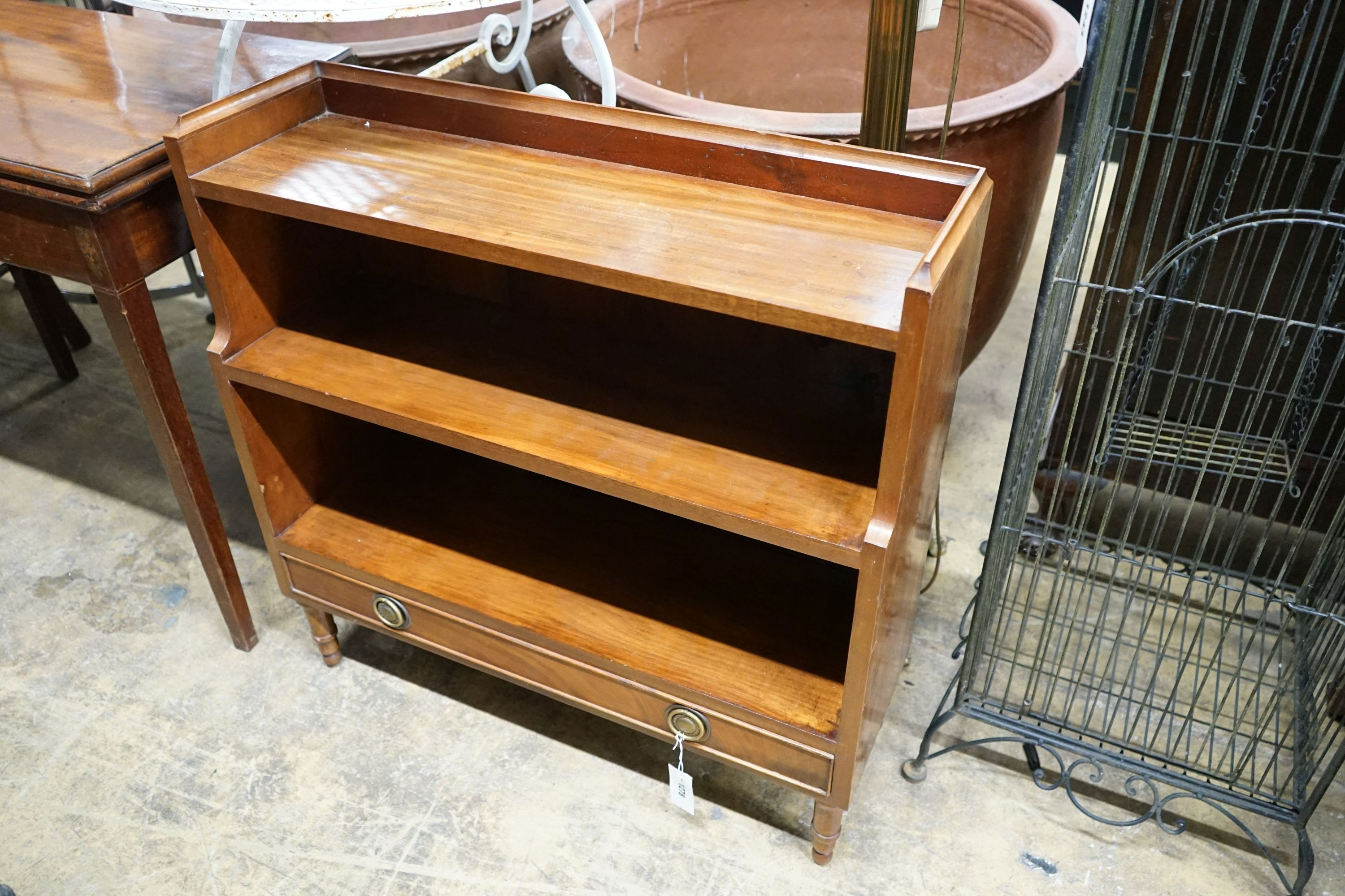 A reproduction Regency style mahogany graduated dwarf open bookcase, width 80 cm, depth 27 cm, height 79 cm.